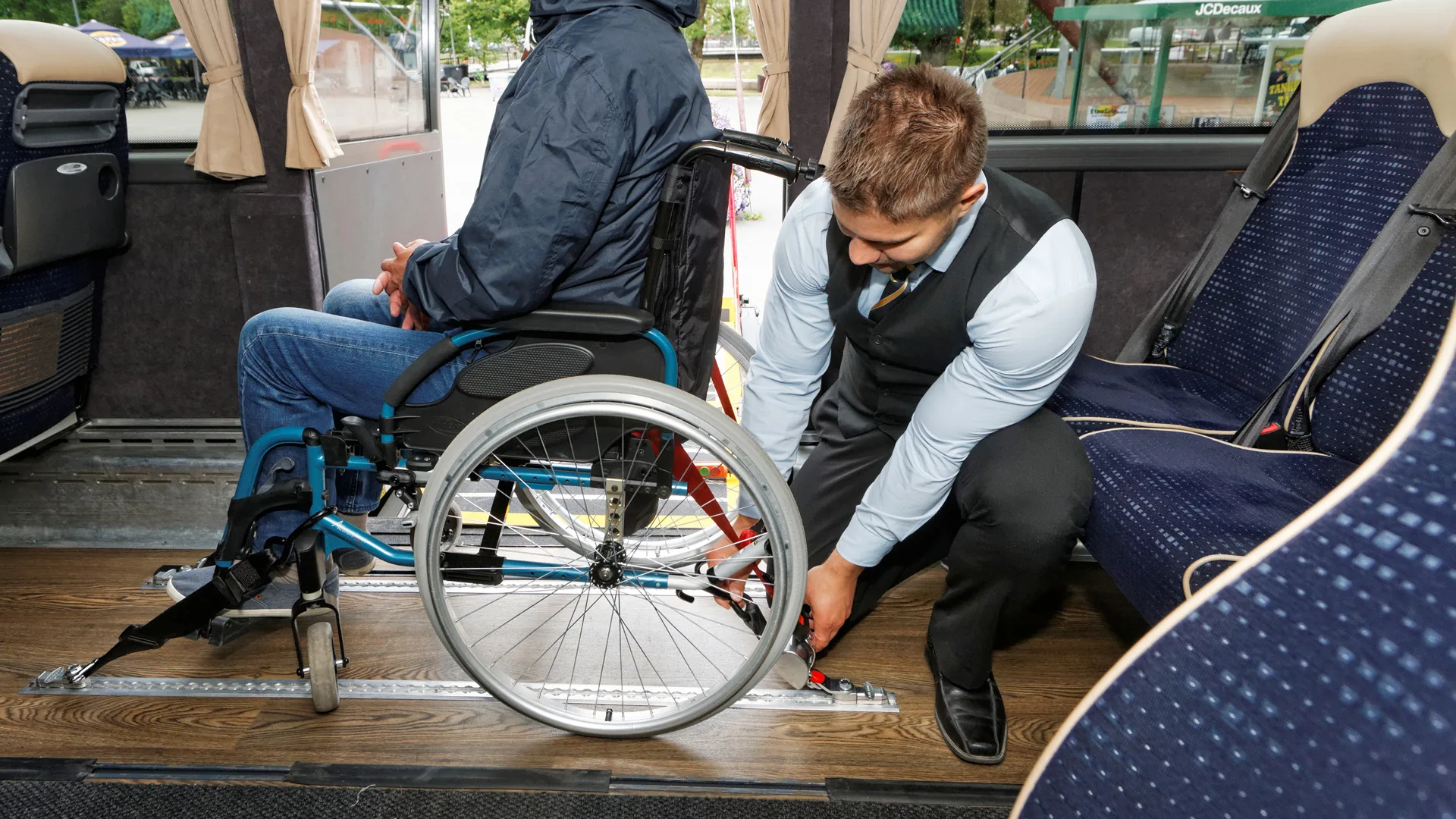 The wheelchair is then fixed firmly to the tracks on the floor. Have a good journey!